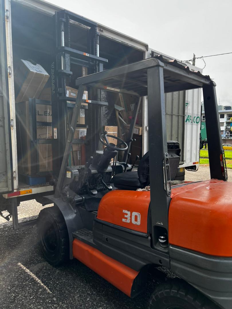 Lunar Ventures forklift loading cargo into a delivery truck